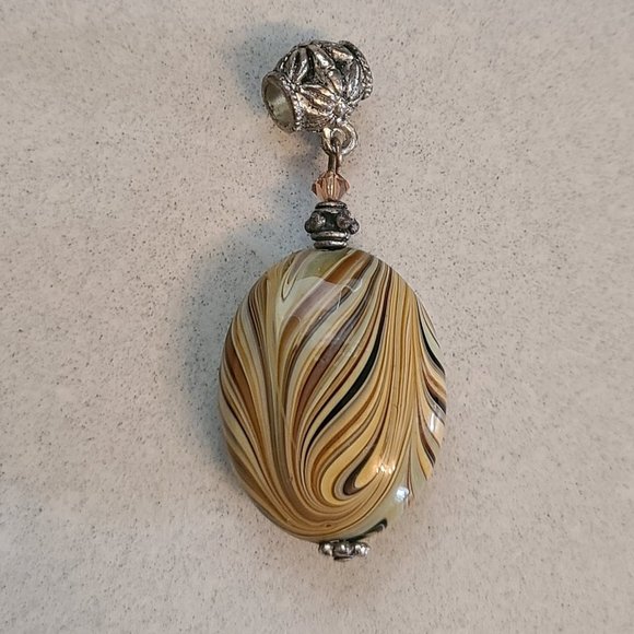 Oval Shaped Beige Pendant with Swirl Detailing - Picture 1 of 8